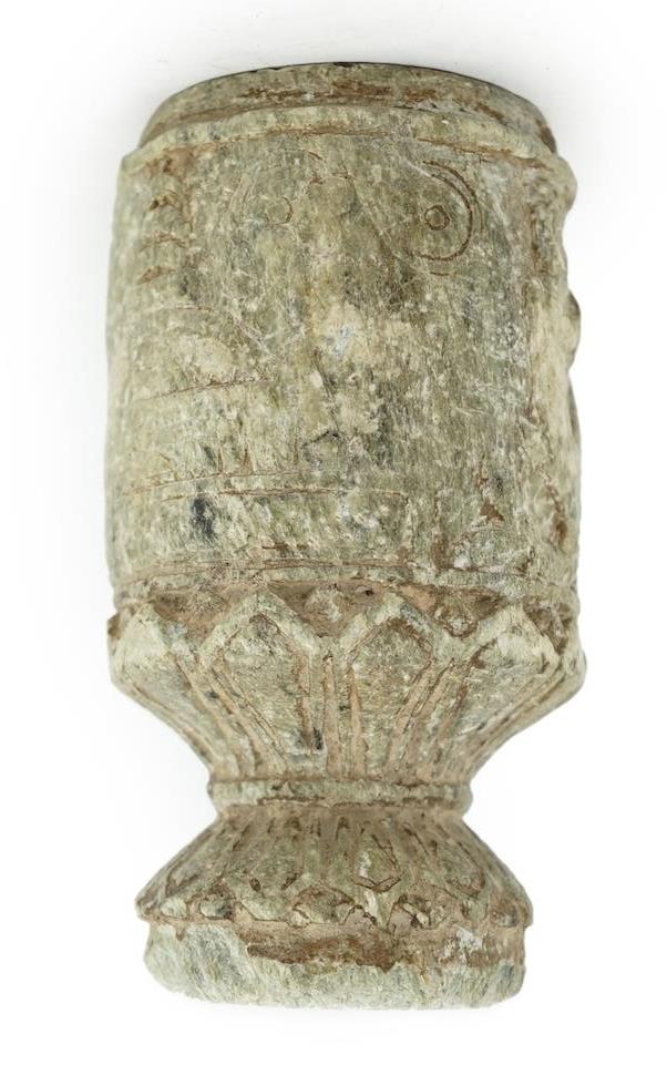 A Gandharan Buddhist carved schist stem cup